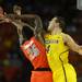 Michigan freshman Mitch McGary knocks the ball away from Syracuse sophomore Rakeem Christmas in the second half of the Final Four in Atlanta on Saturday, April 6, 2013. Melanie Maxwell I AnnArbor.com